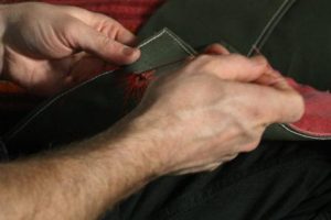 Stitching the lacing pin holes